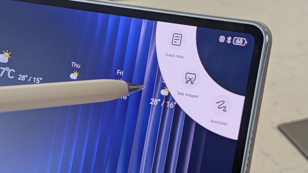 Photos of the Huawei MatePad Pro Max resting on a marble table