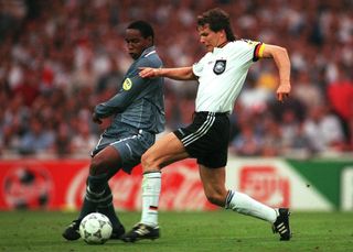 Germany's Andreas Moller is challenged by England's Paul Ince in the teams' Euro 96 semi-final at Wembley.