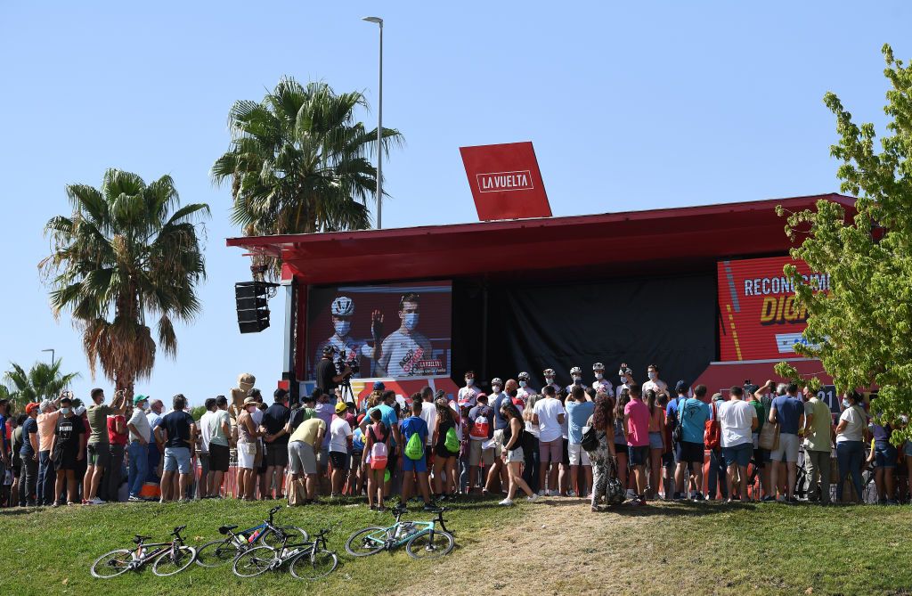 VILLANUEVA DE LA SERENA SPAIN AUGUST 27 A screen shows the presentation of the AG2R Citren Team while the public watches during the 76th Tour of Spain 2021 Stage 13 a 2037km stage from Belmez to Villanueva de la Serena lavuelta LaVuelta21 on August 27 2021 in Villanueva de la Serena Spain Photo by Tim de WaeleGetty Images