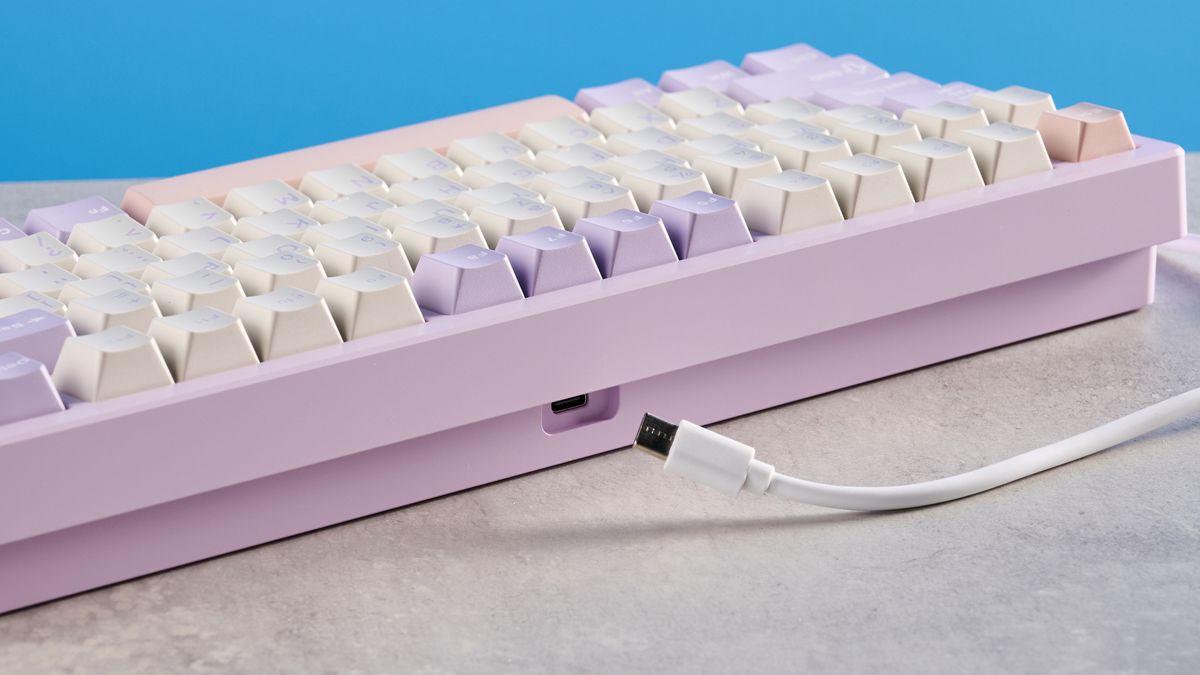 A purple Wobkey Rainy 75 Pro wireless mechanical keyboard with hot-swappable switches