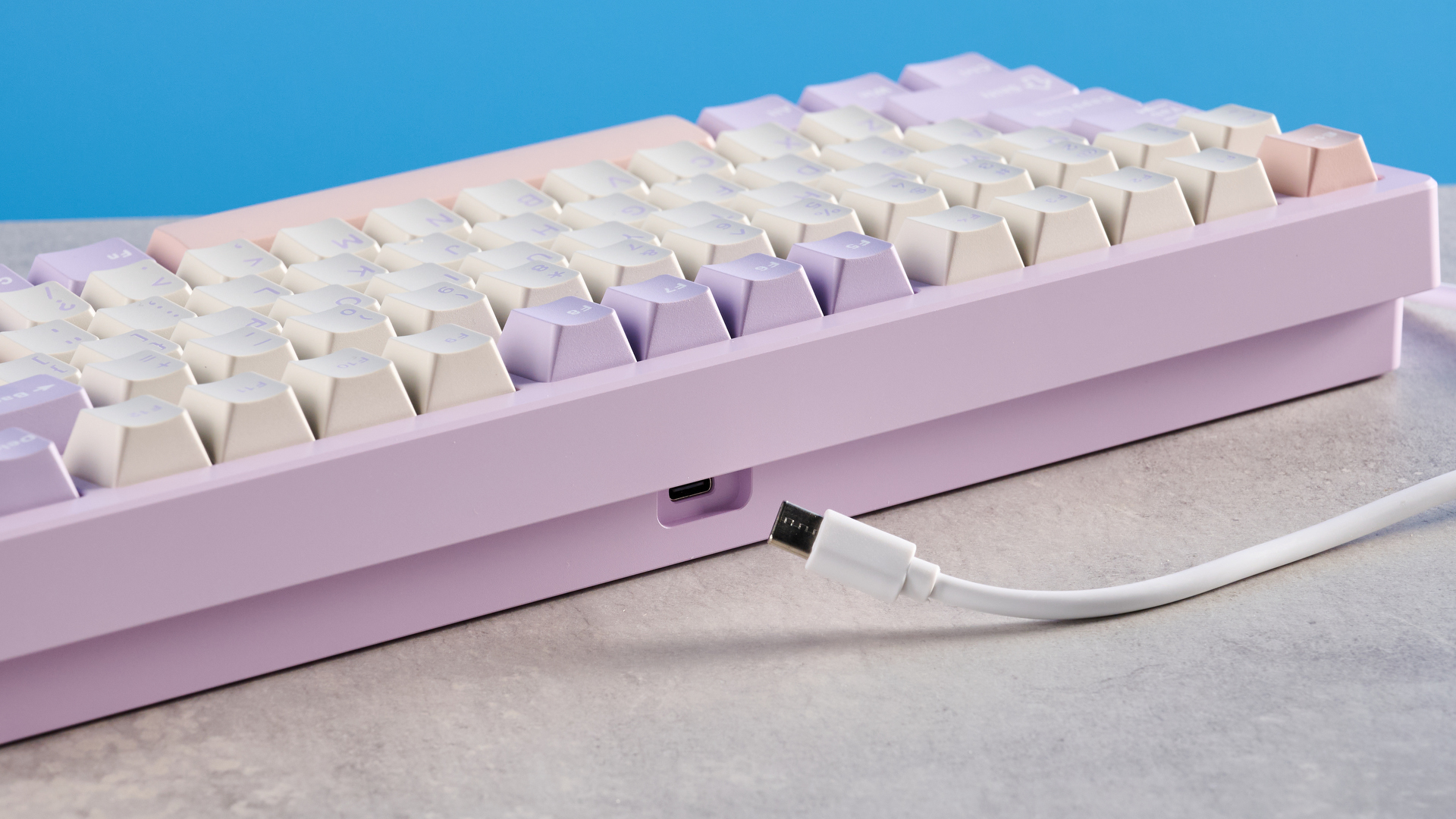 A purple Wobkey Rainy 75 Pro wireless mechanical keyboard with hot-swappable switches