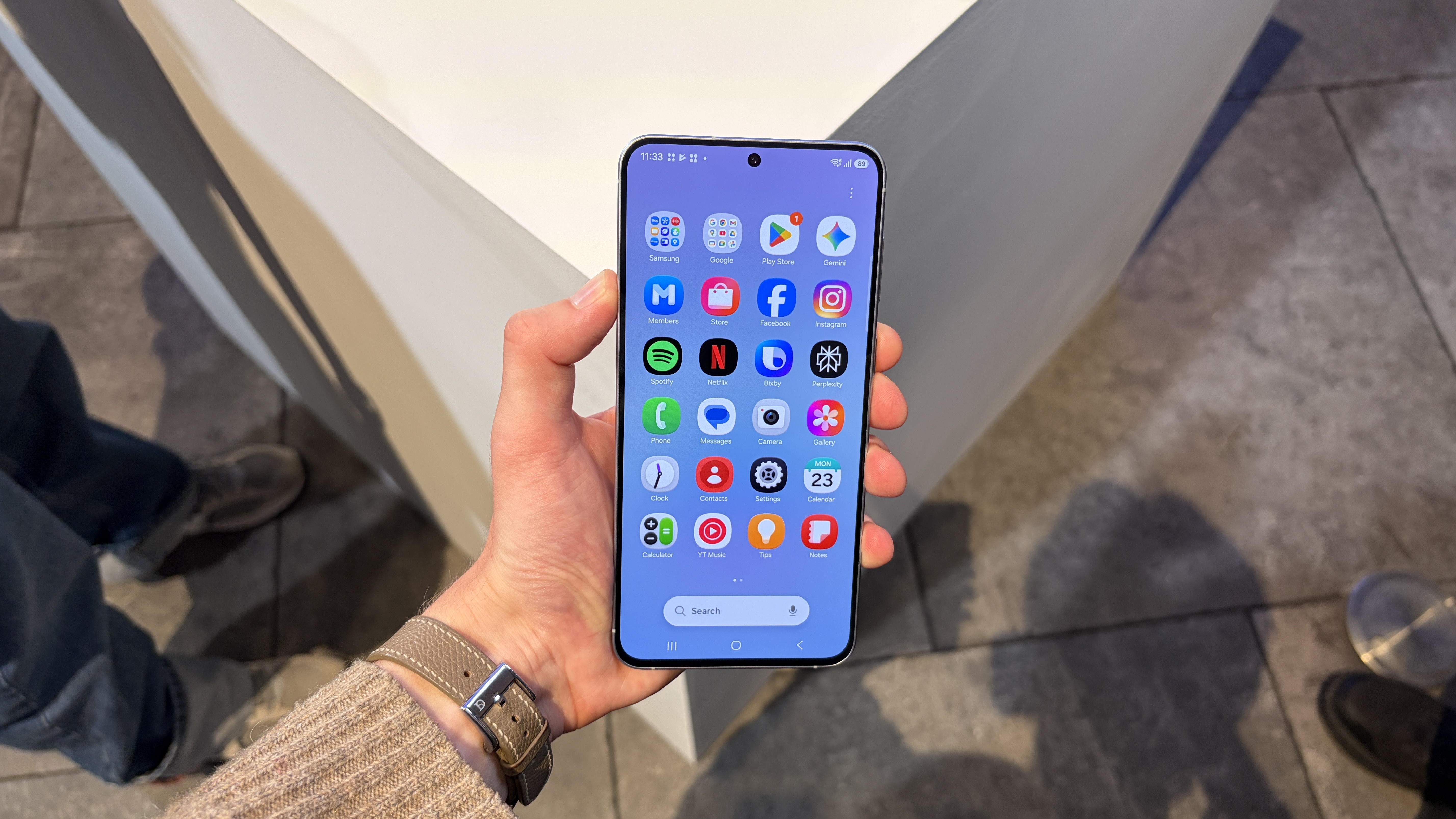 The Samsung Galaxy A57 being held in the hand