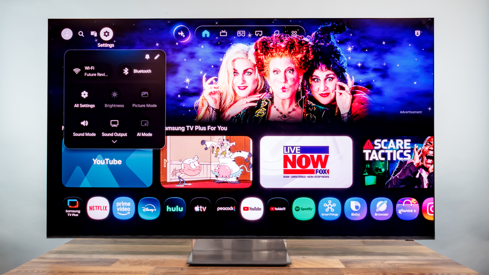 A Samsung R95H Micro RGB TV on a desk