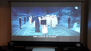 AKIA Screens projection screen showing projected sci-fi movie image