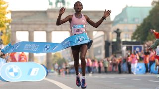 Tigist Assefa crosses the line ahead of the 2023 Berlin Marathon live stream