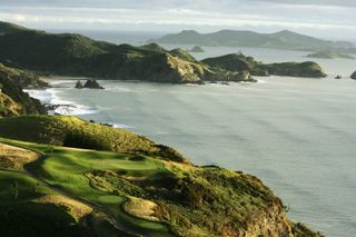 A sweeping view of the Pacific Ocean from the green Kauri Cliffs golf course in New Zealand