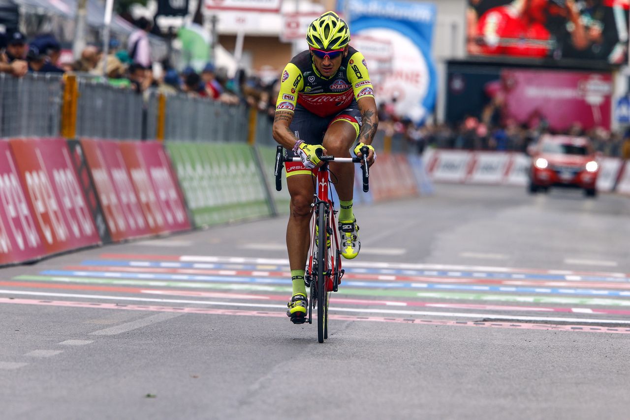 Pippo Pozzato punctured late on