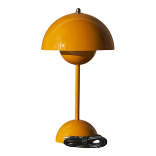 A mustard mushroom portable table lamp