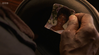 Patrick Trueman holds a picture of his ex-wife Yolande Trueman