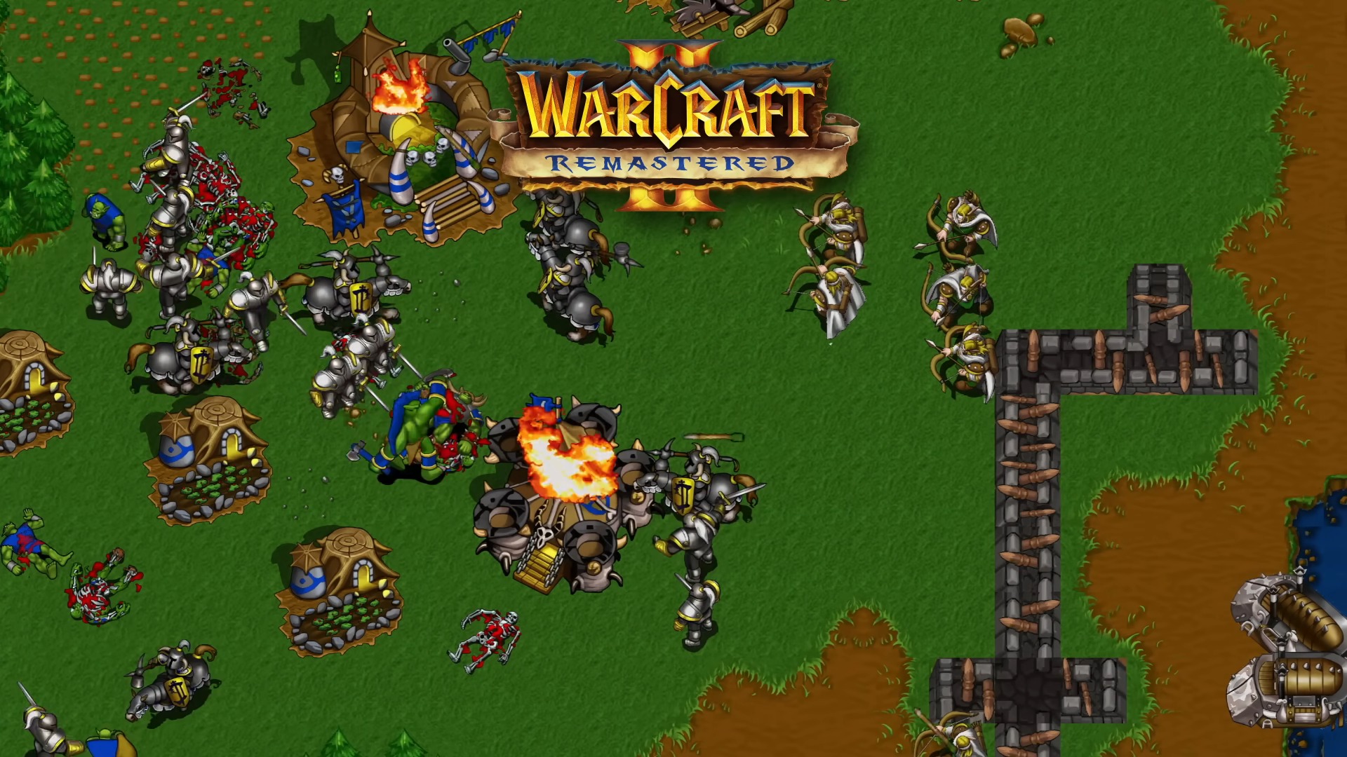 Trailer screenshot of a battle between the Horde and Alliance factions in Warcraft II: Remastered.