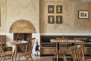 Restaurant with plaster walls and wooden chairs