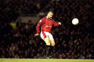 Eric Cantona scores a famous goal for Manchester United against Sunderland in 1996.
