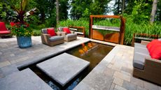 modern patio with gas fire in water
