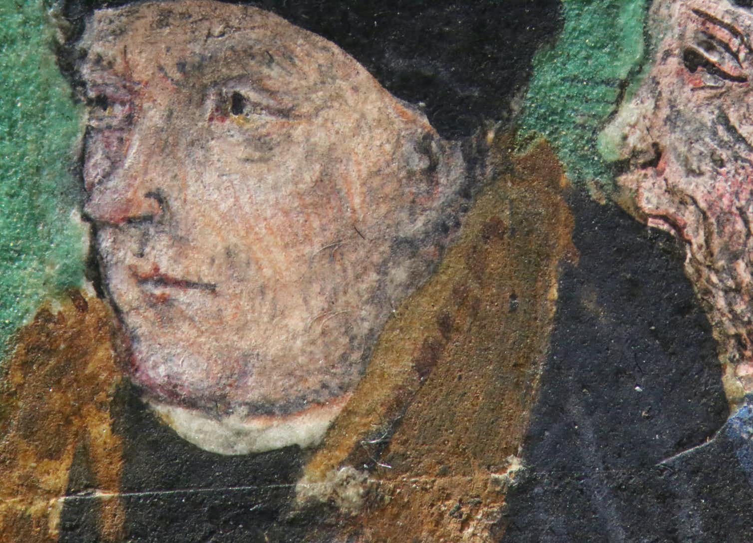 The edges of Cromwell's portrait are barely noticeable but reveal it was painted separately and glued on to the vellum page.