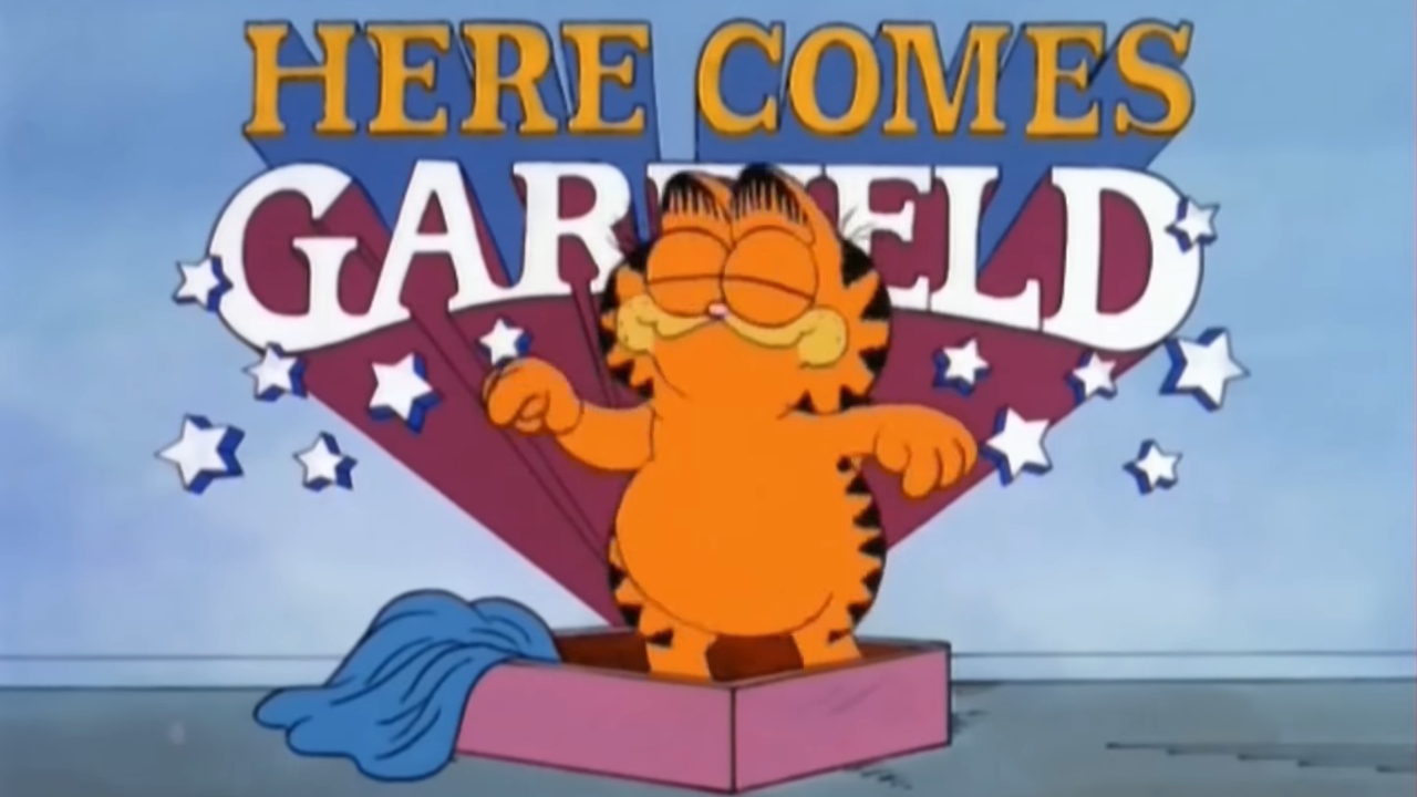 Garfield dancing in front of the Here Comes Garfield title card.