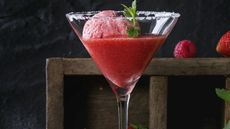 Close up picture of Sicilian cocktail with a scoop of sorbet in a martini glass