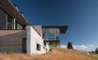 The house cantilevers into the landscape