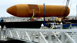NASA's last remaining space shuttle external fuel tank, ET-94, arrives at the port in Marina del Rey in Los Angeles on May 18, 2016. The external tank will be ultimately placed on public display with the shuttle Endeavour at the California Science Center.