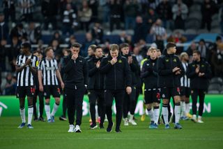 A dejected Eddie Howe walks round the pitch to acknowledge the fans after the UEFA Champions League match between Newcastle United FC and AC Milan at St. James Park on December 13, 2023 in Newcastle upon Tyne, England. (Photo by Visionhaus/Getty Images)