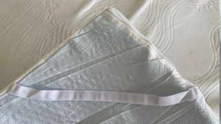 The straps and underside of the TheraPur ActiGel Cool Mattress Topper