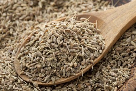 Wooden Spoonful of Medicinal Anise Plant Seeds