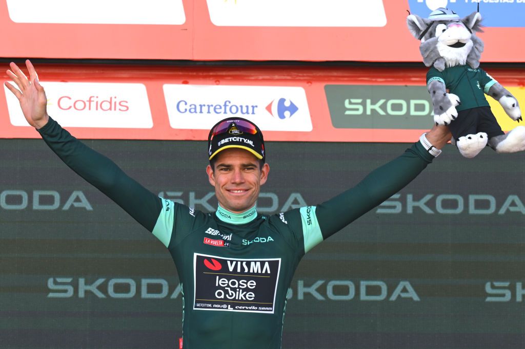 SEVILLE SPAIN AUGUST 21 Wout van Aert of Belgium and Team Visma Lease a Bike Green Points Jersey celebrates at podium during La Vuelta 79th Tour of Spain 2024 Stage 5 a 177km stage Fuente del Maestre to Seville UCIWT on August 21 2024 in Seville Spain Photo by Tim de WaeleGetty Images