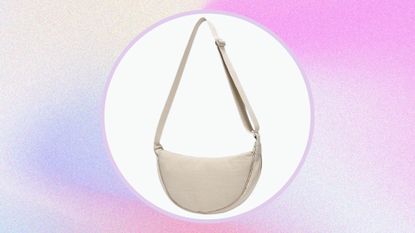 The Amazon YIKOEE Crescent Bag in cream/ on a blue, purple and pink textured, gradient template