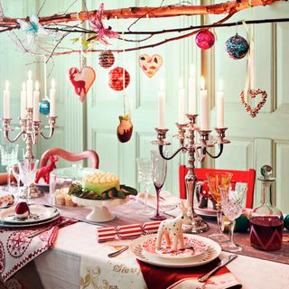 dining room with christmas decorated tableware