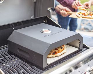 pizza oven which sits on top of a grill