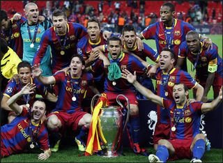 Barcelona's players celebrate after winning the Champions League final against Manchester United at Wembley in 2011.