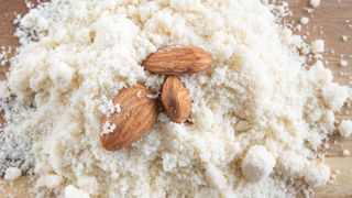Almond flour with three whole almonds