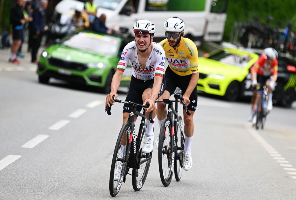 BLATTEN SWITZERLAND JUNE 14 LR Joao Almeida of Portugal and Adam Yates of The United Kingdom and UAE Team Emirates Yellow leader jersey compete in the breakaway during the 87th Tour de Suisse 2024 Stage 6 a 425km stage from Ulrichen to Blatten 1330m UCIWT on June 14 2024 in Blatten Switzerland Photo by Tim de WaeleGetty Images
