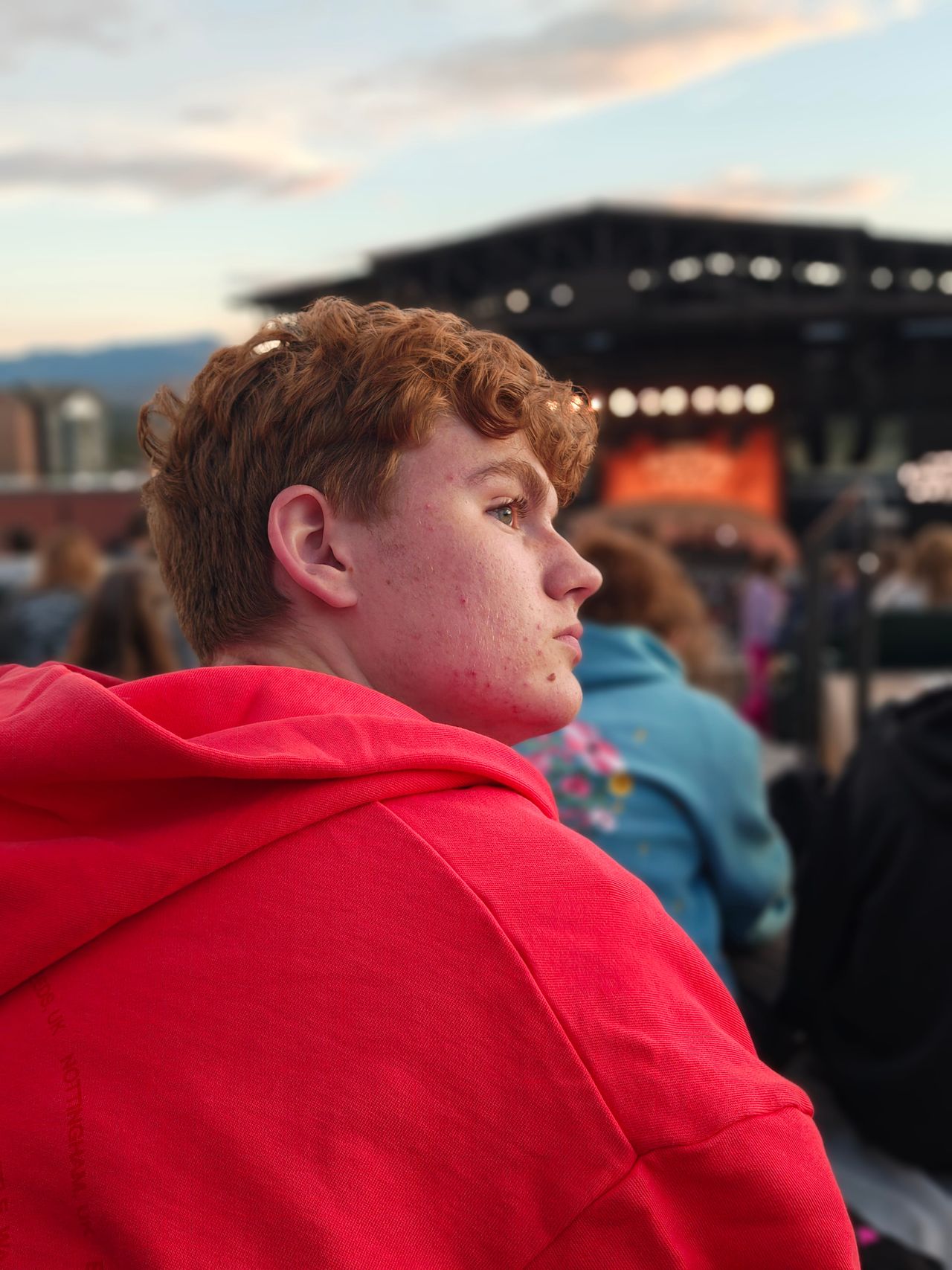 Portrait photos of a family at a restaurant and outdoor concert