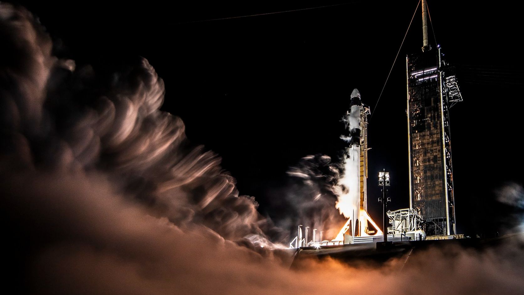 SpaceX fires up rocket ahead of March 2 astronaut launch (photos) | Space