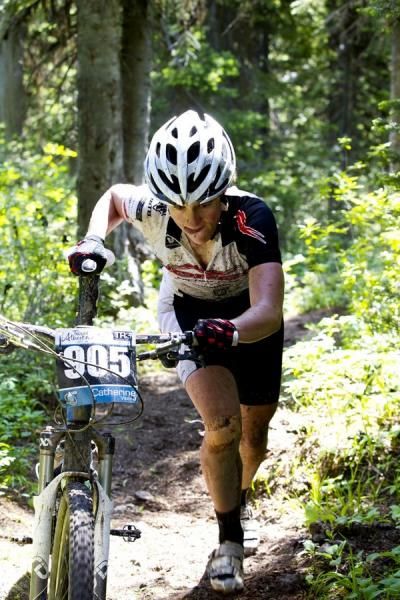 Catherine Vipond walks her bike.