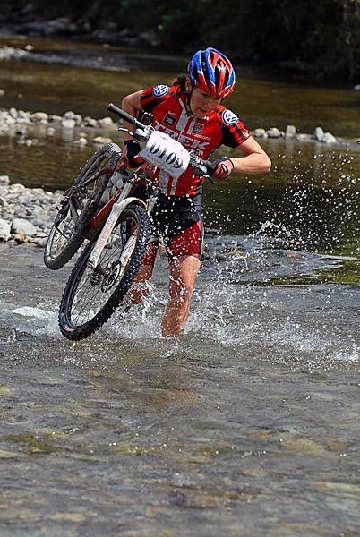 Jenny Smith carries her bike