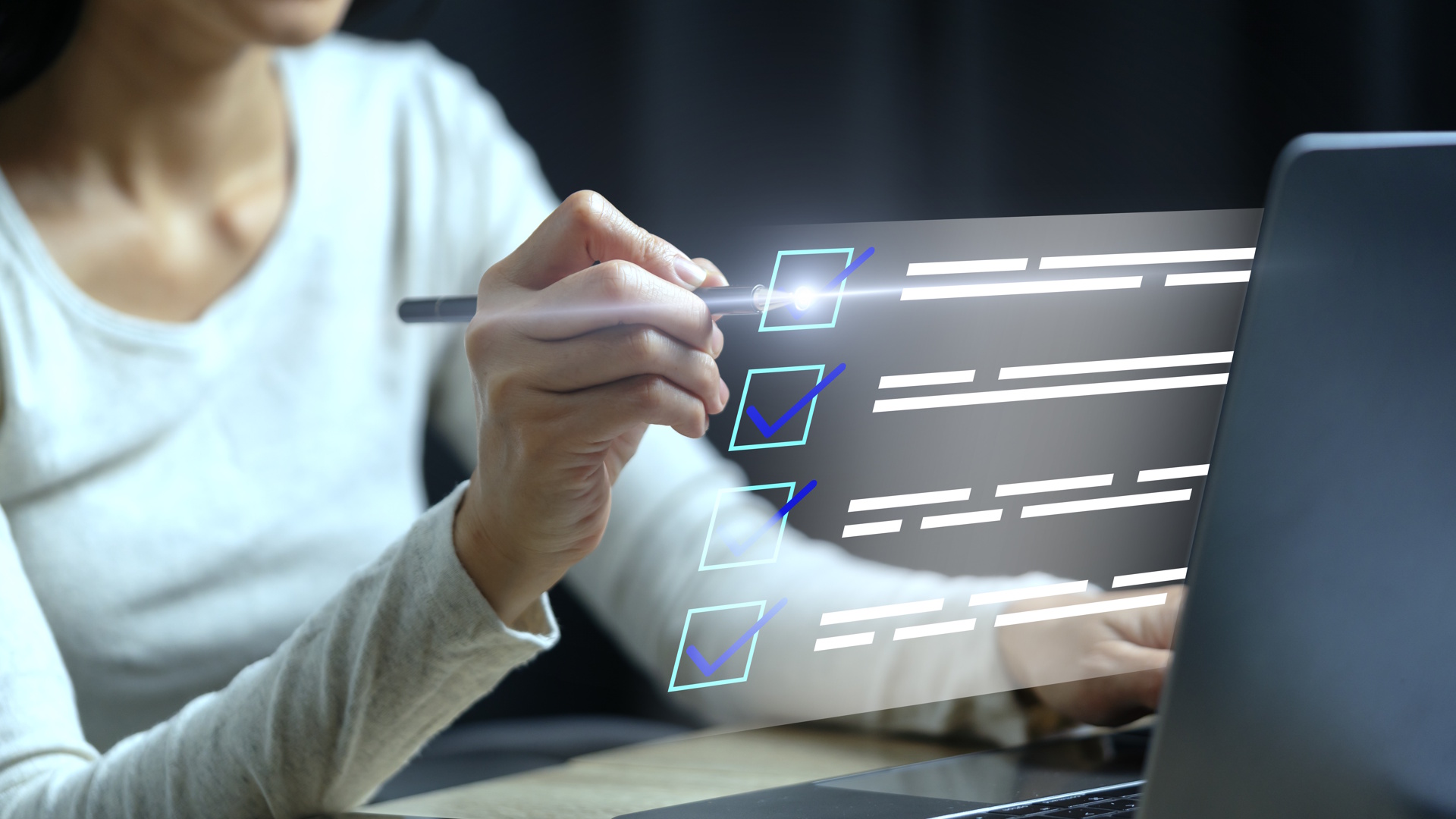 Person with a pen ticking illustrated check boxes.