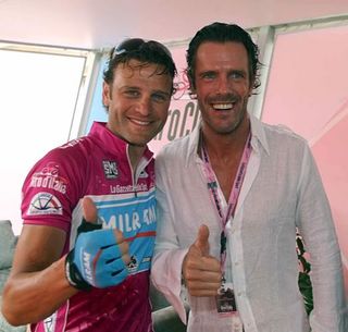 Sprint greats Alessandro Petacchi and Mario Cipollini pose together at the finish of stage 10.