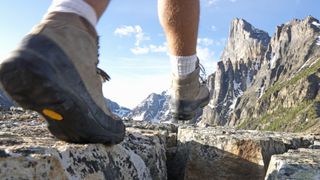 A hiker's feet in the mountains