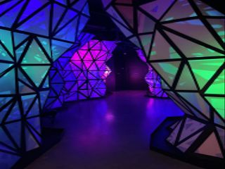 Immersive technology shines in a rainbow of colors at Meow Wolf.