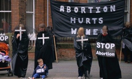 Anti-abortion protesters: Nurses in South Dakota must now tell women seeking abortions that the procedure can increase their risk of suicide.