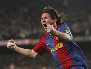 Lionel Messi celebrates after scoring his second goal for Barcelona against Real Madrid at Camp Nou in March 2007.