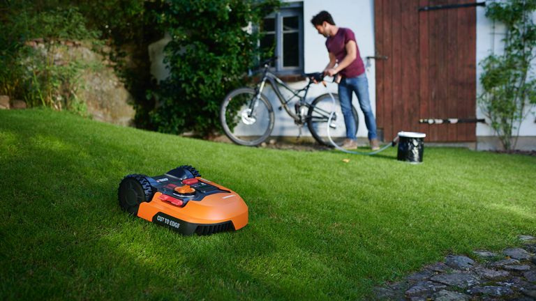 Worx Landroid M500 Plus robot lawn mower in operation on a lawn
