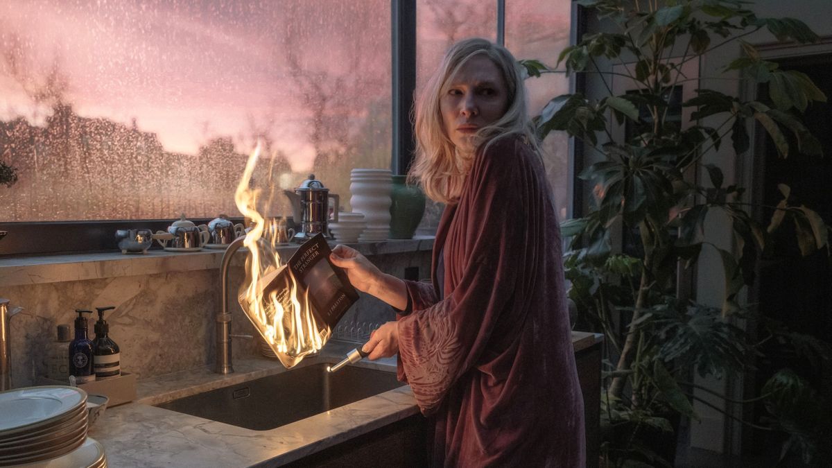 Catherine (Cate Blanchett) holds a burning book in her kitchen in Apple TV Plus thriller &quot;Disclaimer&quot;