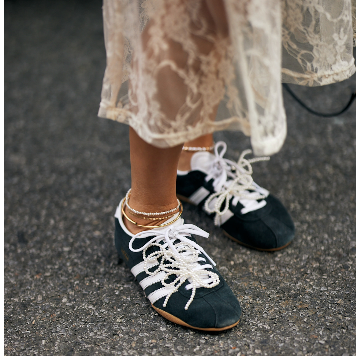 woman wearing adidas sneakers