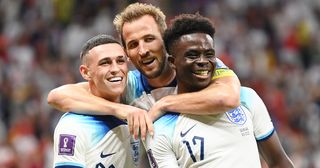 When are the international breaks this season? Bukayo Saka of England celebrates with Phil Foden and Harry Kane after scoring the team's third goal during the FIFA World Cup Qatar 2022 Round of 16 match between England and Senegal at Al Bayt Stadium on December 04, 2022 in Al Khor, Qatar.