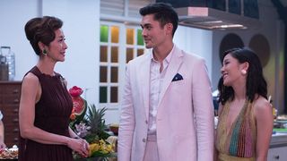 Henry Golding stands in his family kitchen in Crazy Rich Asians