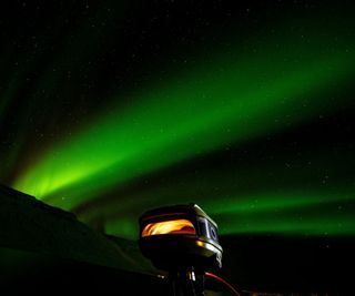 A Gozney Tread under an aurora