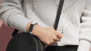 Woman wearing the Fitbit Inspire HR