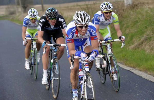 Tour of Flanders: Sylvain Chavanel (Quick Step) leads Ian Stannard (Sky), Peter Sagan and Maciej Bodnar (Liquigas-Cannondale). They would be caught close to the line.
